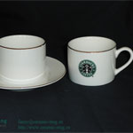 Short white Starbucks ceramic coffee mugs with gold rim