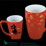 Large red trumpet shaped ceramic coffee cup with logo
