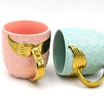 Cheap mermaid ceramic mugs with tail handle Pearl glaze ceramic coffee cups suppliers