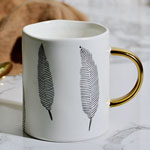 Cheap porcelain nordic ceramic mugs with leaf logo wave top golden handle factory