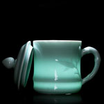 Custom celadon ceramic tea mugs with bamboo leaf Relief ceramic cups manufacturers