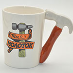 Custom handmade ceramic coffee mug with hammered handle